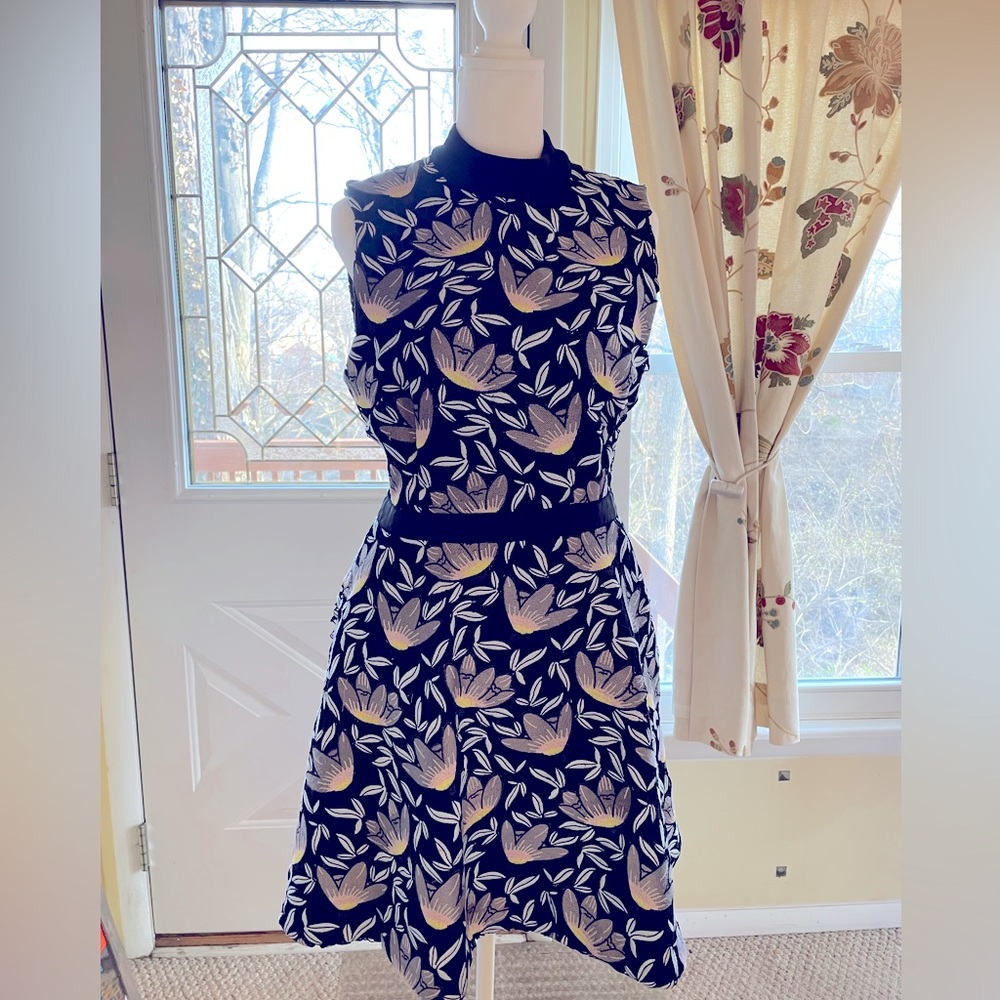 Superb quality appliqué detailed dress from CUSP.